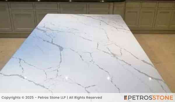 http://quartz.petrosstone.com/storage/2025/03/Calacatta-Venato-Quartz-Countertop-2.jpg